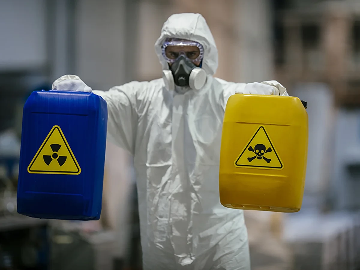 Biohazard cleanup technicians in protective equipment at a remediation scene in Renton, WA